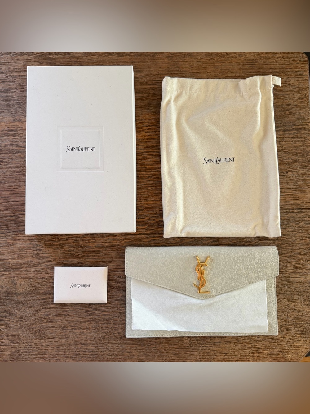 Saint Laurent Cream Leather Envelope Clutch with Gold YSL Logo